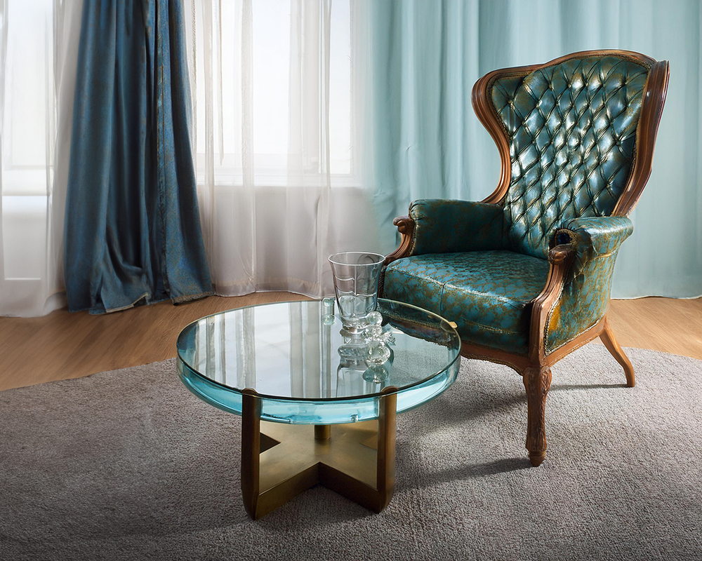 Victorian-era-chair-with-a-modern-acrylic-coffee-table