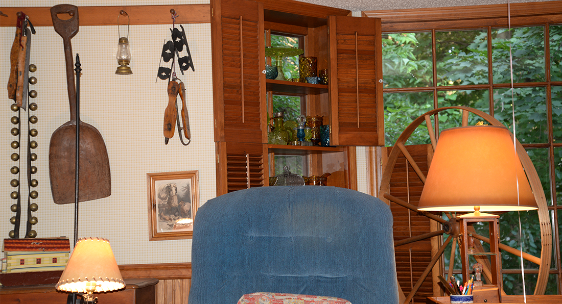 room decorated with antique in Minnesota cabin