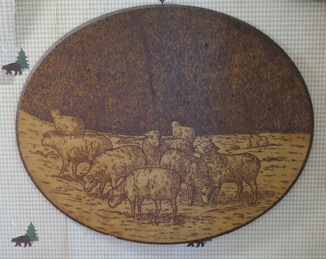 sheep and field carving with pyrography