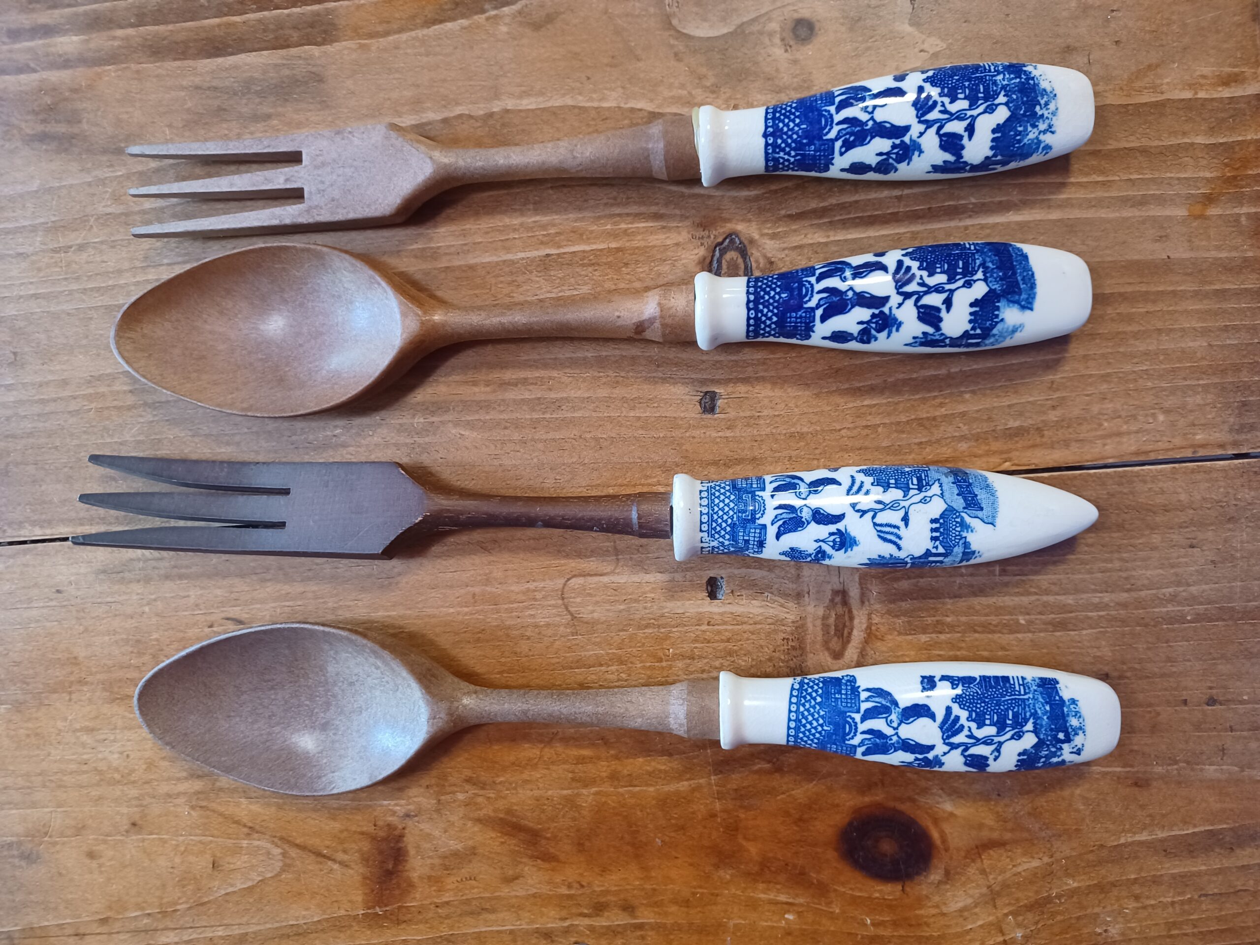 spoons and forks with blue willow handles